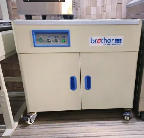 Box Strapping Machine